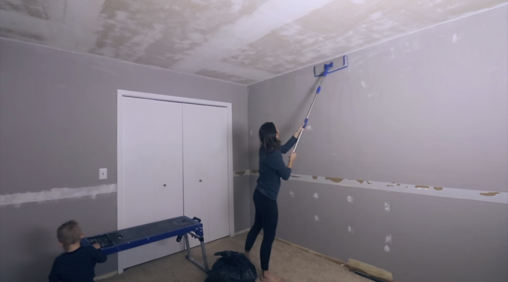 cleaning the dusty walls off